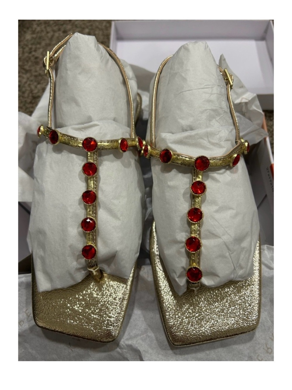 Katy Perry Collections Gold T-Strap Flats with Red Gem Accents